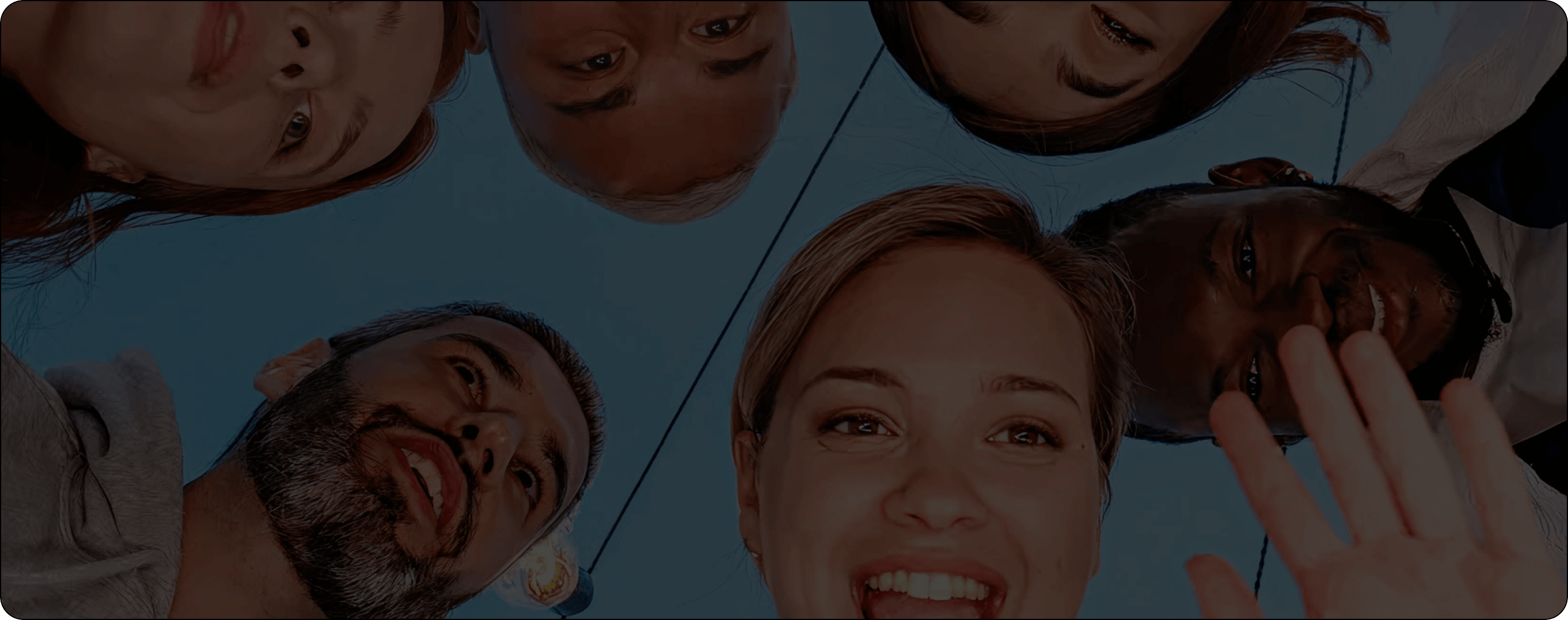 Group of people standing in a circle with a blue gradient background