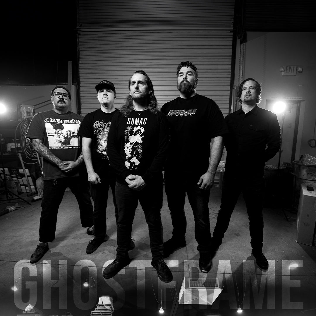 Black and white photo of a band posing together with 'Ghost Flame' text.