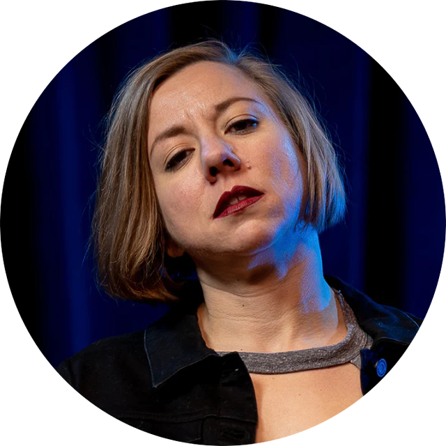 blonde woman with red lipstick and blue backgroud