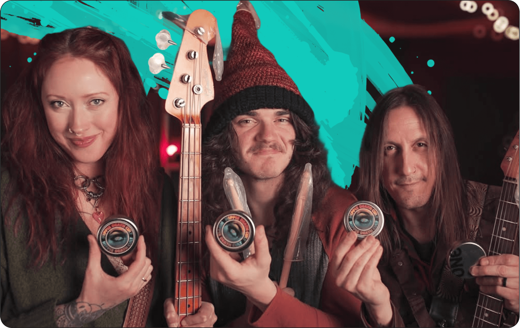 Three people holding up small circular objects with a colorful background
